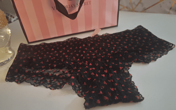 Victorias Secret:  black underwear with red designs - M
